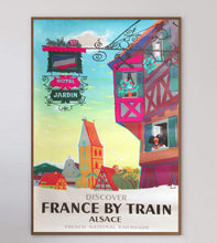 Load image into Gallery viewer, Colorful travel poster for France by train featuring a colorful building and scenic landscape.