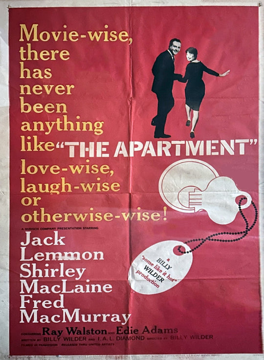 Vintage movie poster for 'The Apartment' with text and illustration of a man and woman.