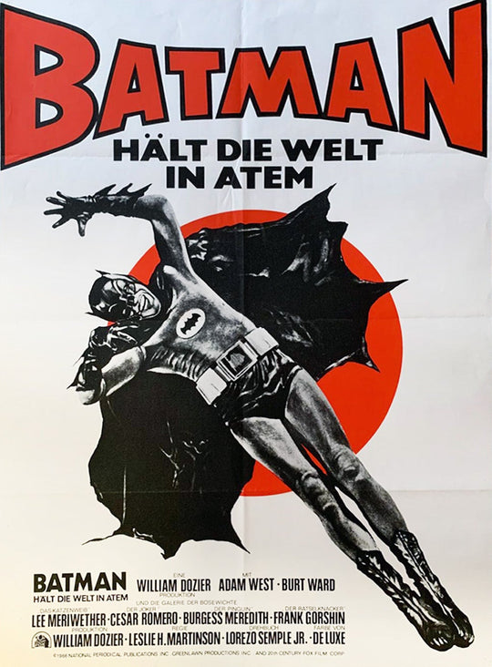 Vintage movie poster for 'Batman' with a superhero in action against a red circle background.