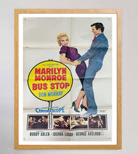 Load image into Gallery viewer, Movie poster featuring Marilyn Monroe and Don Murray with a bus stop sign, framed on a wall.