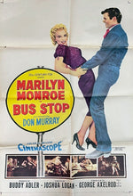 Load image into Gallery viewer, Vintage movie poster for 'Bus Stop' featuring Marilyn Monroe and Don Murray, framed on a white wall.