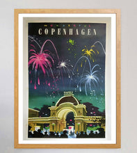 Load image into Gallery viewer, Framed poster of a vintage-style advertisement for Copenhagen with fireworks and a building.