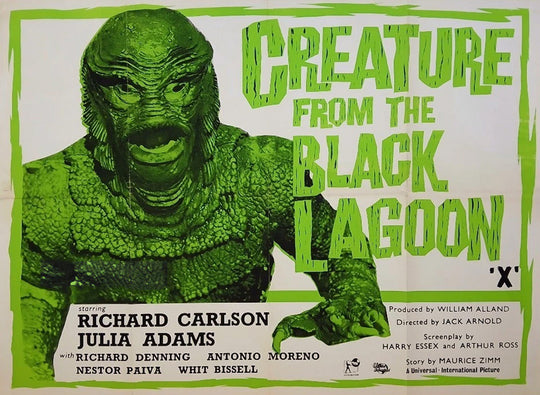 Vintage movie poster for 'Creature from the Black Lagoon' with green creature illustration.