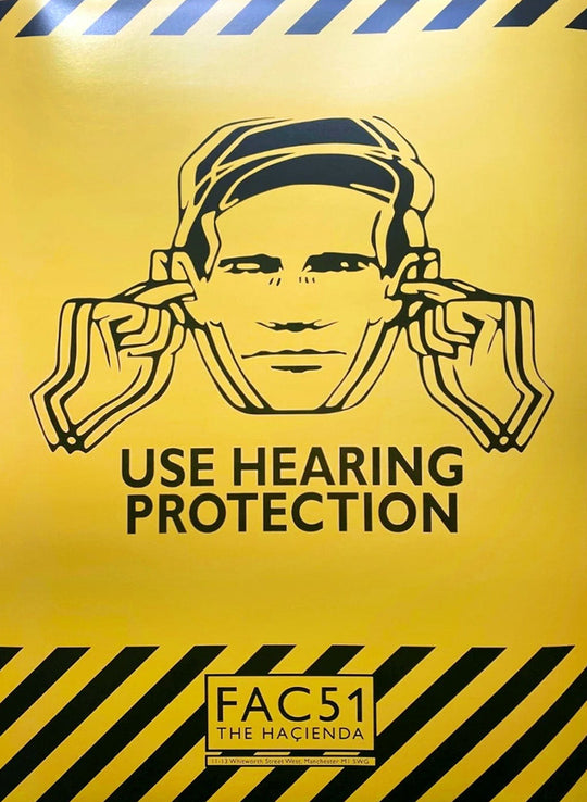 Warning sign with 'Use Hearing Protection' on a yellow background.