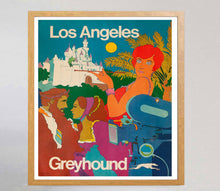 Load image into Gallery viewer, Vintage-style travel poster for Los Angeles with a woman, castle, and palm trees, framed on a light gray background.