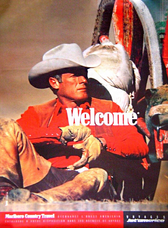 Cowboy in a red shirt and white hat holding a gun, with text 'Welcome' and 'Vintage Western' branding.