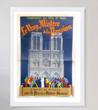 Load image into Gallery viewer, Vintage-style poster of a cathedral with people around it, framed on a gray wall.