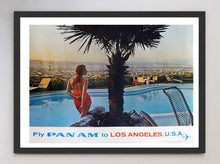 Load image into Gallery viewer, Vintage-style advertisement for Pan Am featuring a person by a pool with a cityscape in the background.