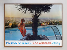 Load image into Gallery viewer, Vintage-style travel poster for Pan Am featuring a woman by a pool with a cityscape in the background.