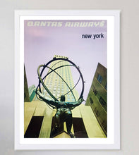 Load image into Gallery viewer, Framed poster of Qantas Airways New York with a statue and building in the background.
