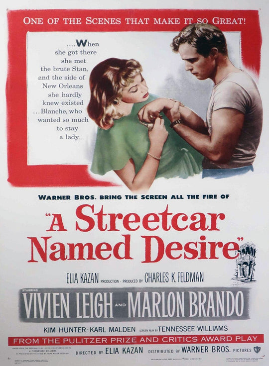 Vintage movie poster for 'A Streetcar Named Desire' featuring Vivien Leigh and Marlon Brando.