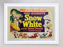 Load image into Gallery viewer, Vintage poster for Walt Disney's 'Snow White and the Seven Dwarfs' with colorful characters and text.