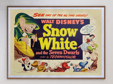Load image into Gallery viewer, Vintage poster for Walt Disney's 'Snow White and the Seven Dwarfs' with colorful characters and text.