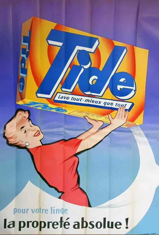 Vintage Tide laundry detergent advertisement with a woman holding a box on a white background