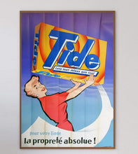 Load image into Gallery viewer, Vintage Tide laundry detergent advertisement with a woman holding a box on a white background