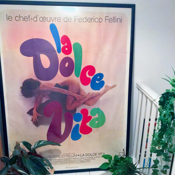 “La Dolce Vita” poster on the stairs