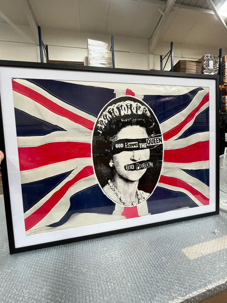 Sex Pistols “God Save the Queen” flag poster, being packed