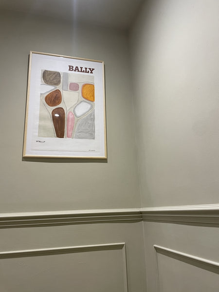 Bally poster in a panelled hallway
