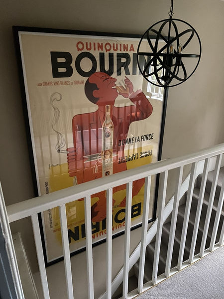 “Ouinquina Bourin” poster on the stairs