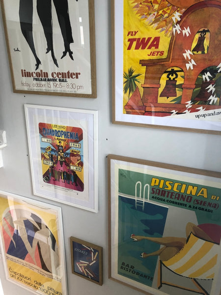 A gallery wall of vintage posters