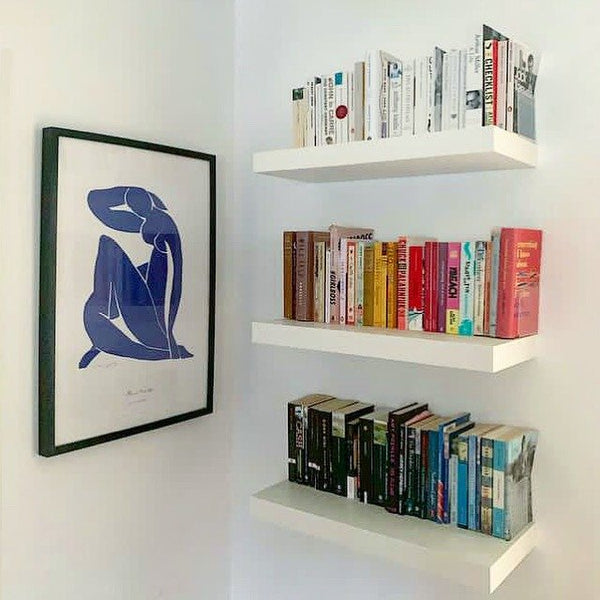 Matisse blue line drawing by the bookshelf
