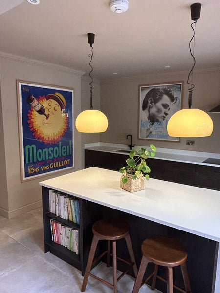 “Monsoleil” and Chet Baker posters in the kitchen