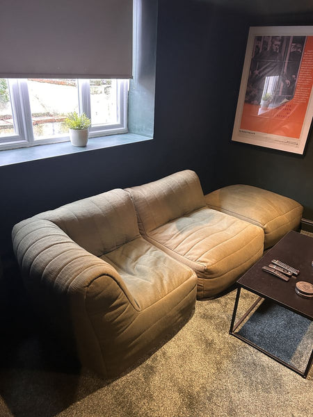 “Bullitt” poster above the sofa