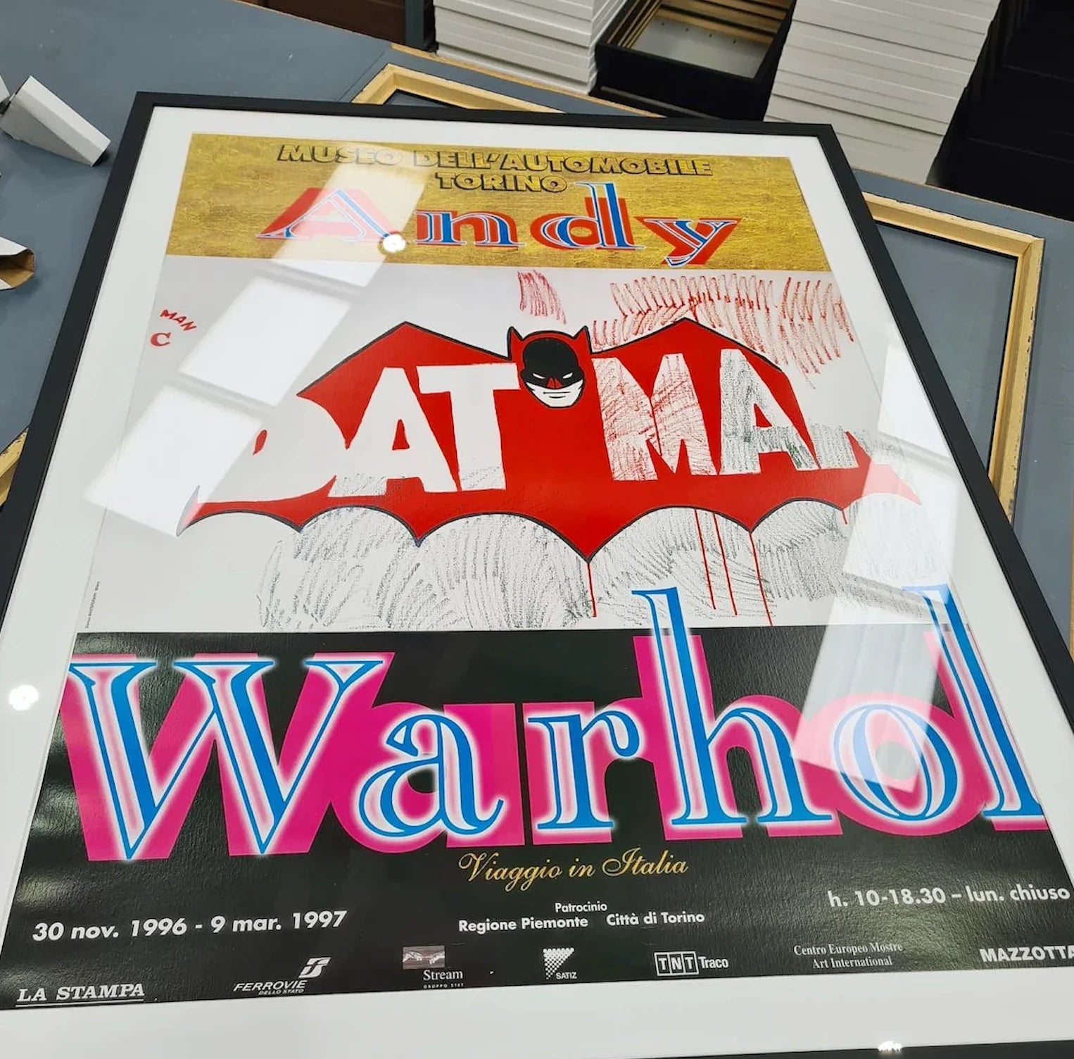 An original Andy Warhol Museo dell'Automobile Torino poster, conservation framed and face-up on the bench in our workshop