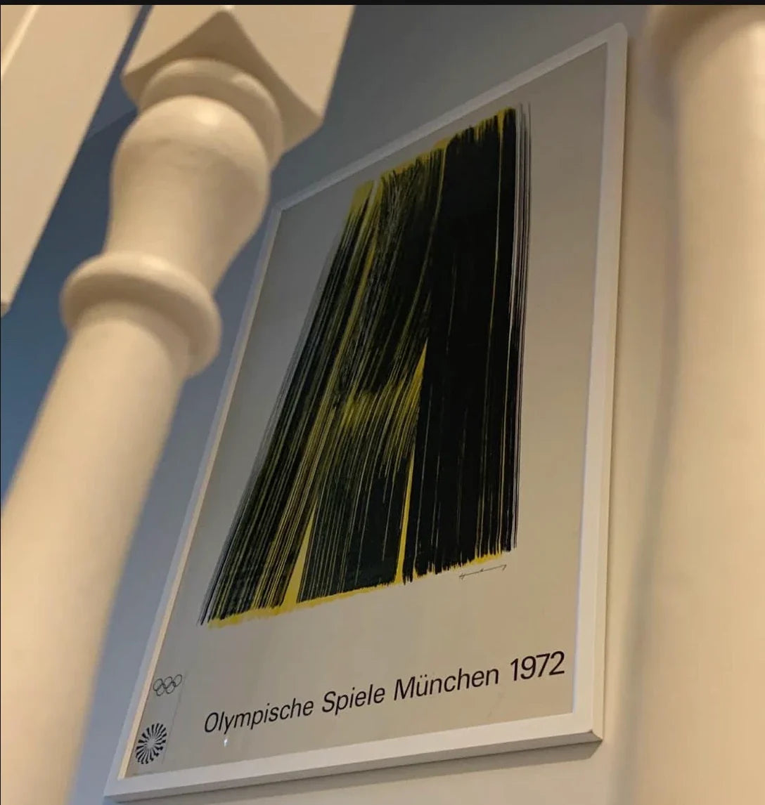 An original Hans Hartung poster for the 1972 Munich Olympics, framed and hung at home