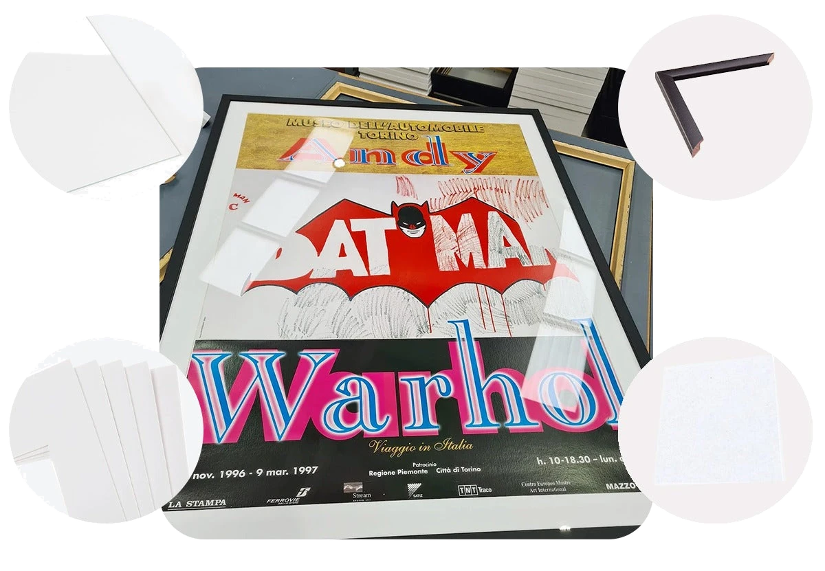The four layers of a Printed Originals conservation frame shown around a framed Andy Warhol Torino poster: clarity glazing, a moulding corner, conservation mount boards and barrier board