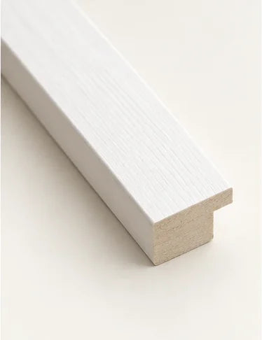 Cut section of the white moulding, showing the rebate at the back of the frame